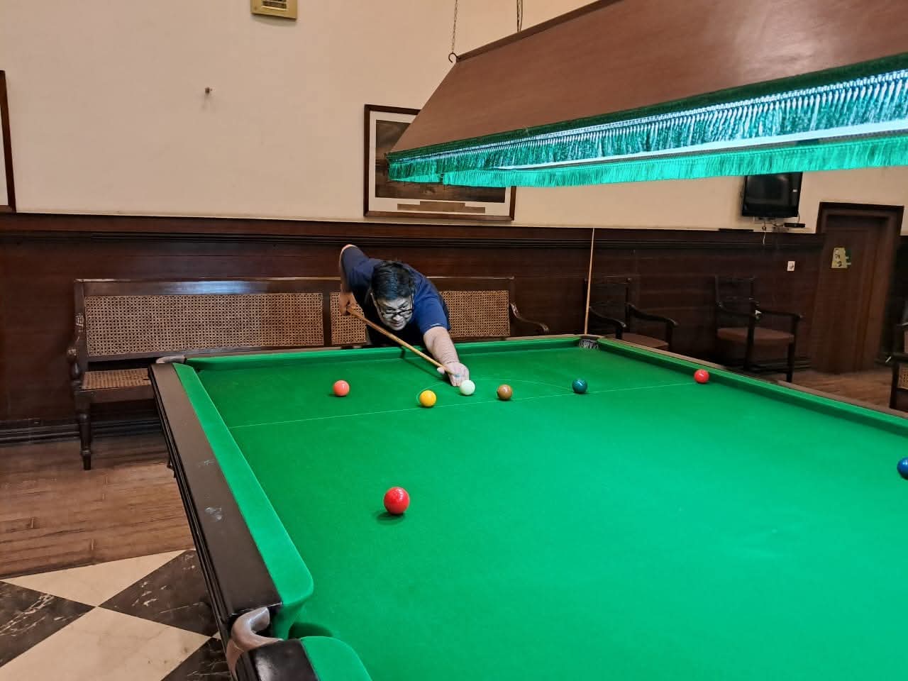 Playing billiards at a club